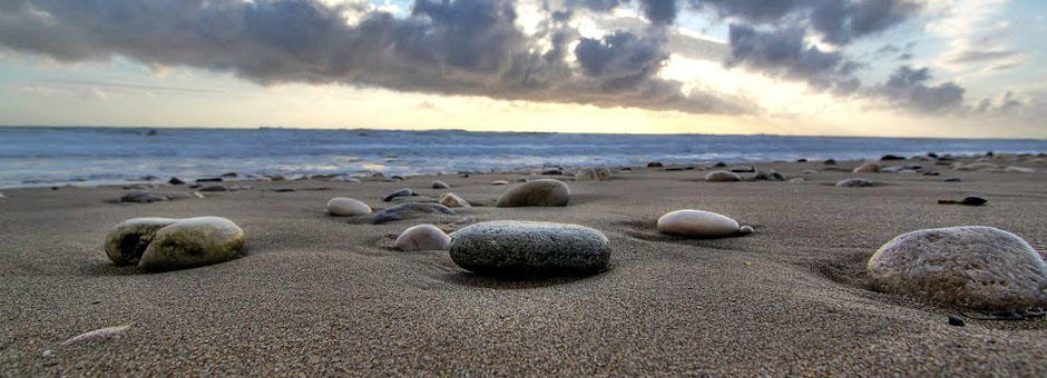 Rocks on the sand of Agios Gordios